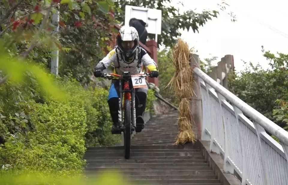 The participant was riding down the stairs
