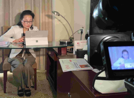 How does the NPC hear from its deputies?