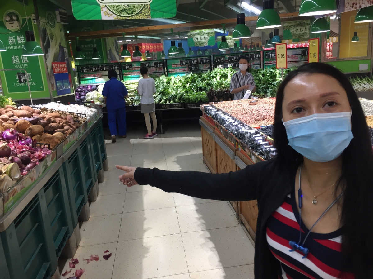 Shopping for produce, a well stocked store in Chongqing.
