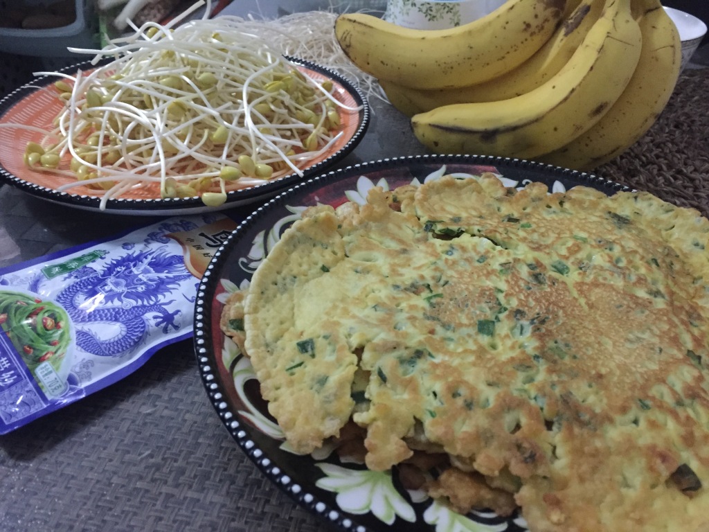 Delicious pancakes and fresh sprouts.