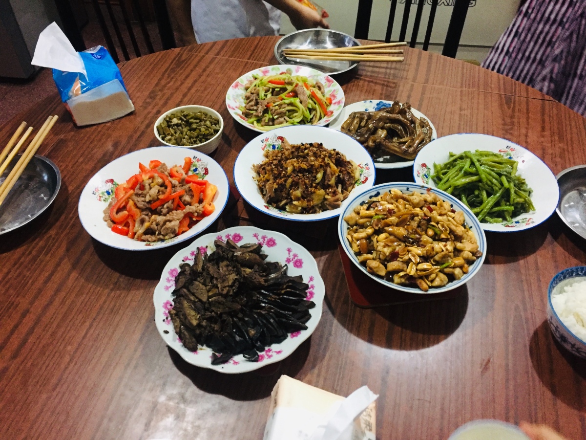 A comforting, grounding ritual mid-Gaokao: the family lunch roundtable shared dining experience.