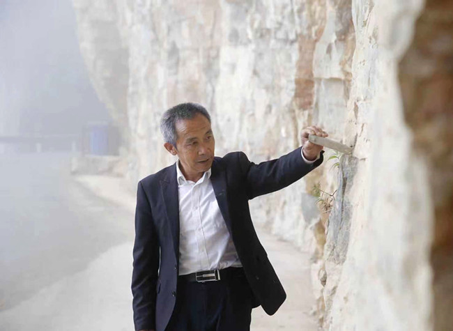 'Precipitous Sky Road' Hero Mao Xianglin Carves Legacy as National Poverty Alleviation Model