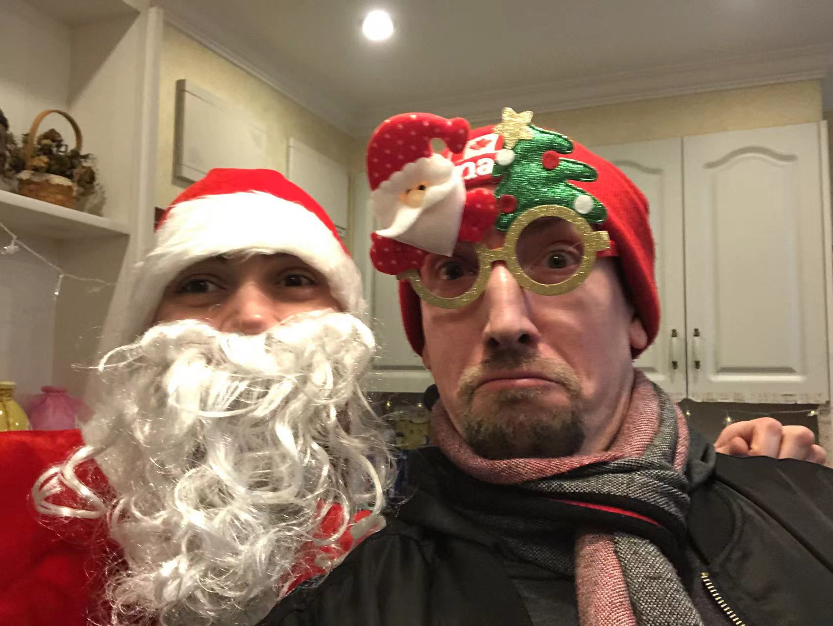 Santa Jacob and Perplexed Elf Kai, Christmas, 2021.