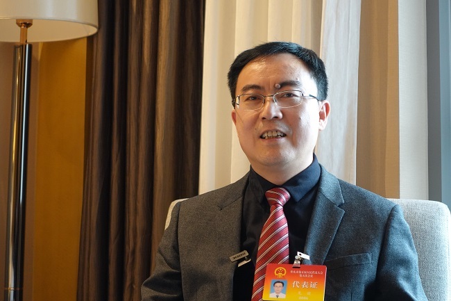 Driving Chongqing from Internationalization to Globalization丨Deputy's Motion