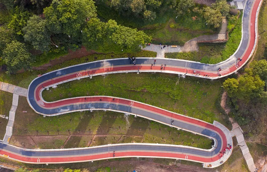 Trails with ramps winding the cliff line.