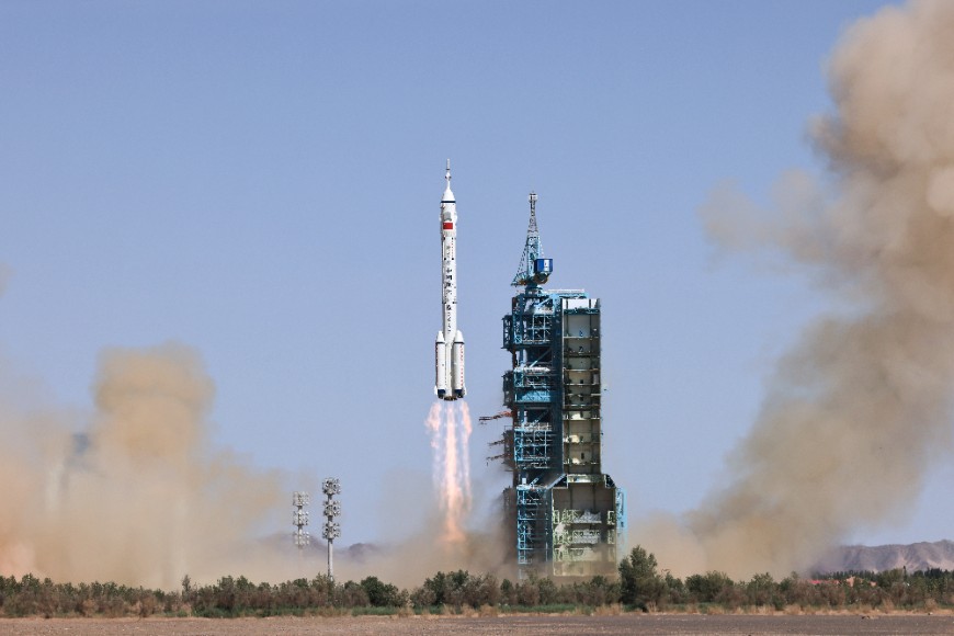 The crewed spaceship Shenzhou-14, atop a Long March-2F carrier rocket, is launched from the Jiuquan Satellite Launch Center in northwest China, June 5, 2022.