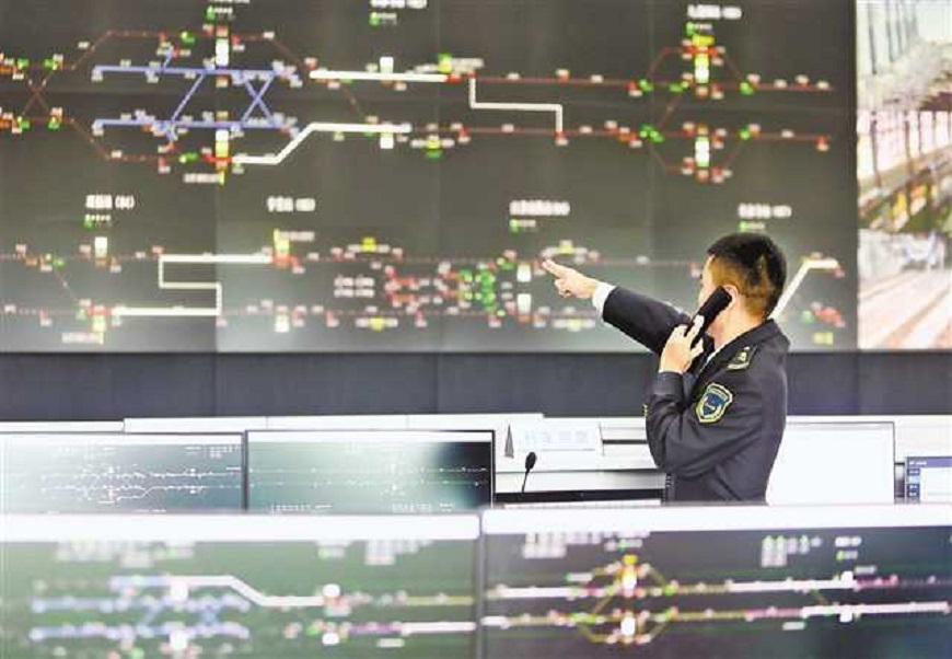 A staff monitors tram operation at the dispatching hall on July 23, 2022.