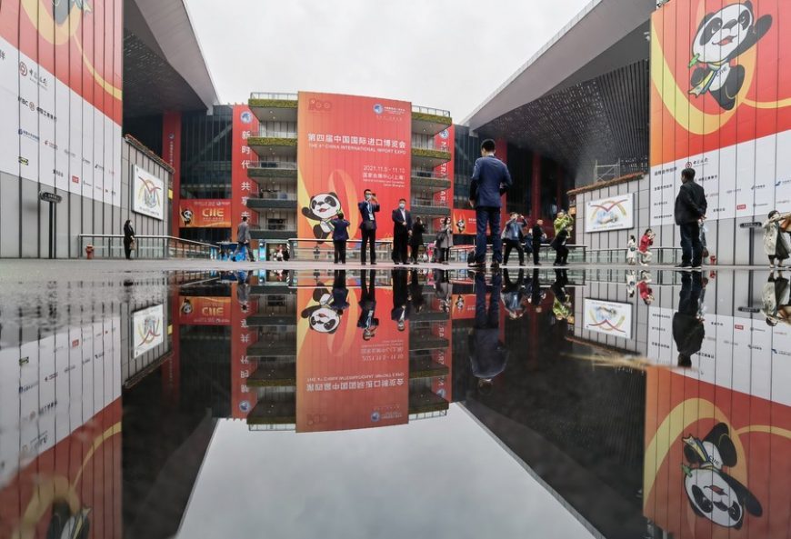 Visitors take photos at the National Exhibition and Convention Center (Shanghai), the main venue for the fourth China International Import Expo (CIIE), in Shanghai, east China, Nov. 6, 2021. (Xinhua/Lu Peng)