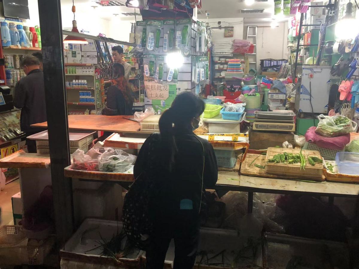 Some of the few shops in Shiqiaopu that weren't closed were picked clean, and late shoppers were surprised to find options were few.