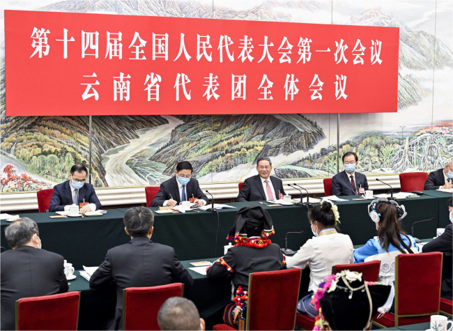 NPC Deputies Urged to Ensure People's Well-being