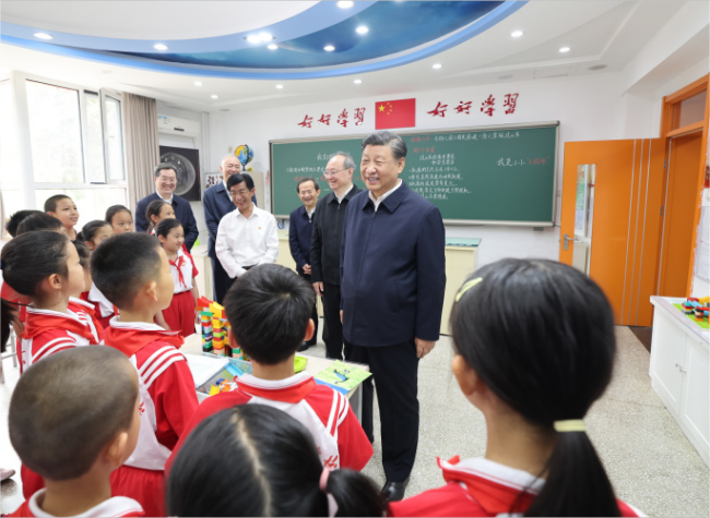 Xi Visits Beijing School Ahead of International Children's Day
