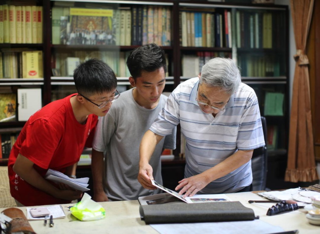 Cambodian Youths Witness Protection Achievements of Dazu Rock Carvings
