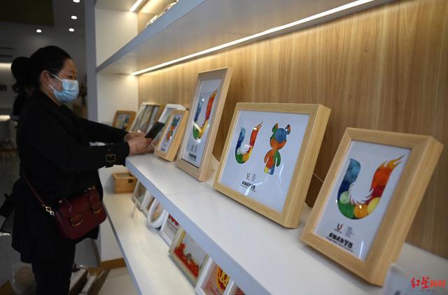 Craftsmen Create Stunning Paper-Rolling Artworks for FISU World University Games
