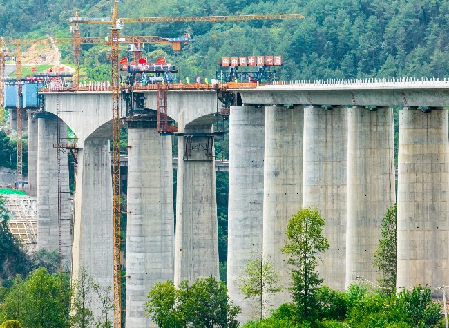 Chongqing's Majestic T-Structure Bridge Arches over Several National Highways