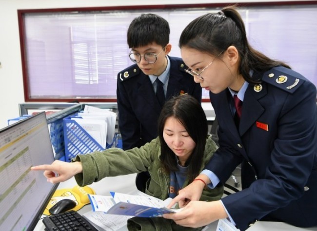 China Eases Business Burden with More Tax, Fee Support