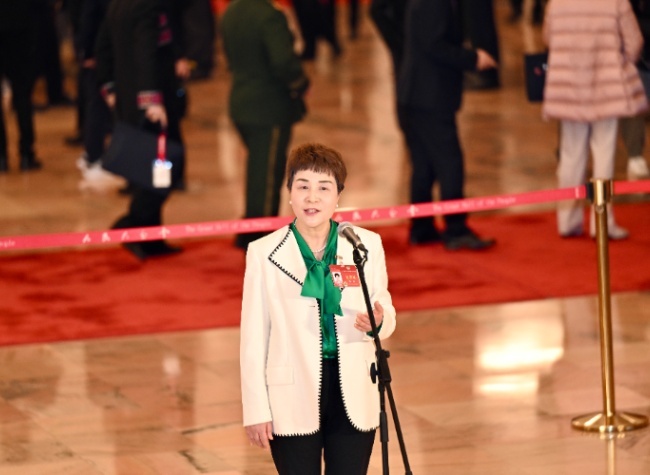 Her Commitment to Enhancing Community Service in Chongqing | CPPCC Member