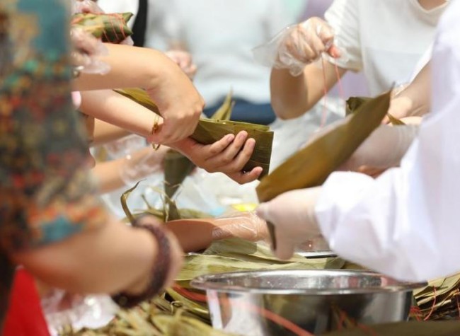 Traditional, Modern Customs Merge During China's Dragon Boat Festival