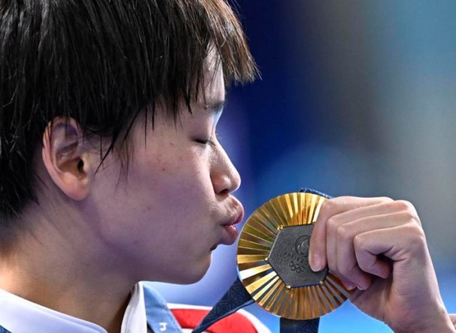 Olympics: Sensational Quan Retains Diving Title, Multiple New Records Created