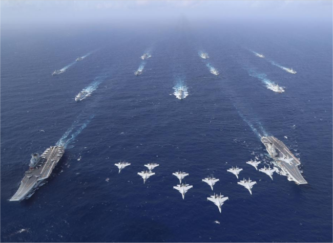 Chinese Navy Conducts Dual Aircraft Carrier Formation Exercise for First Time