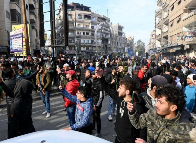 Syrian Capital Falls to Rebels as Al-Assad Leaves Syria