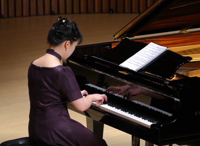 Bai Xinyu's Piano Recital Enchants Audiences in Chongqing