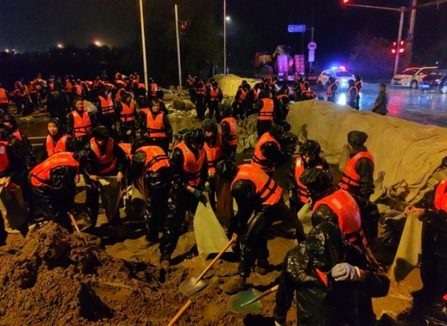 All-Out Rescue Efforts Underway as Rainstorms Leave 30 Dead in Beijing