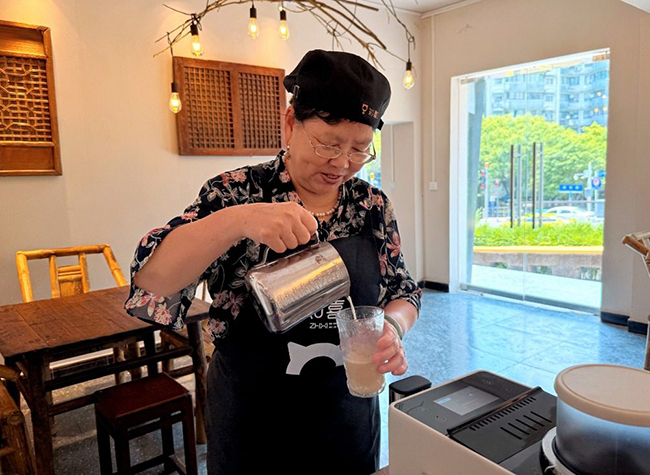 Silver-Haired Barista Unlocks Community Renewal in Container Café