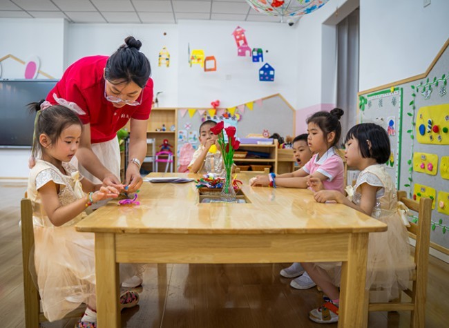 China Announces Phased Implementation of Free Preschool Education