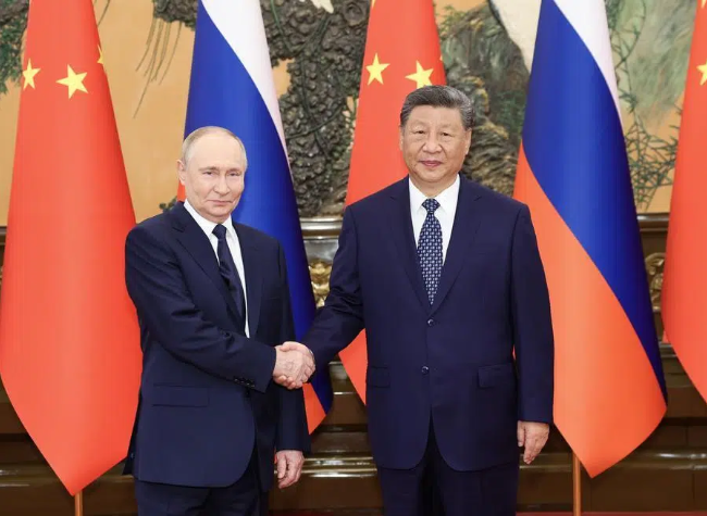 Xi, Putin Laud Bilateral Ties, Vow Further Cooperation