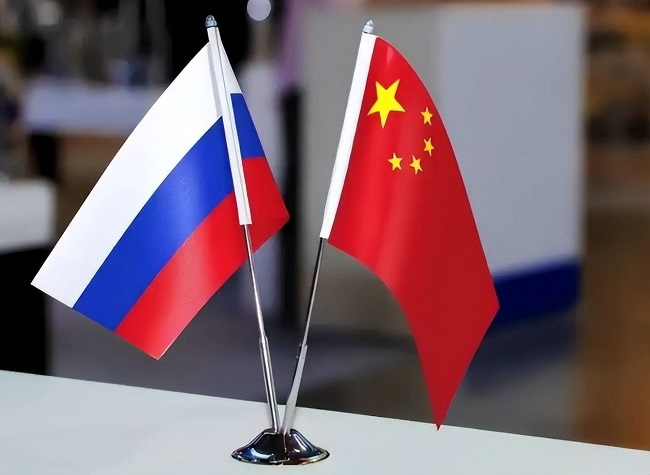 Chinese, Russian FMs Call for Safeguarding Outcomes of WWII Victory