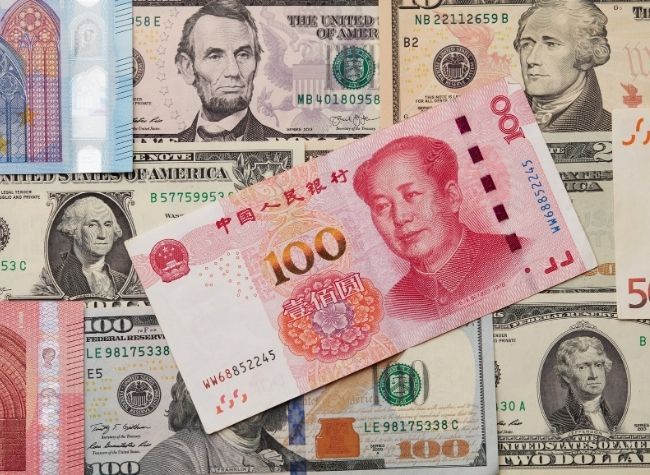 Chinese Yuan Strengthens to 6.9843 against USD Monday