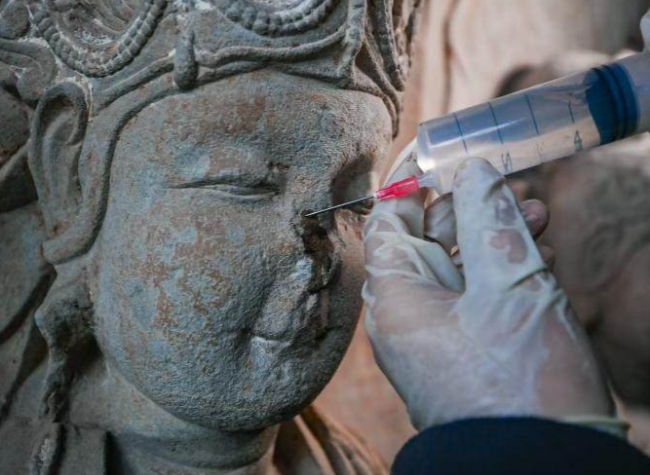 How the Dazu Rock Carvings Conservation Team Treats Millennia-Old Stone Carvings?