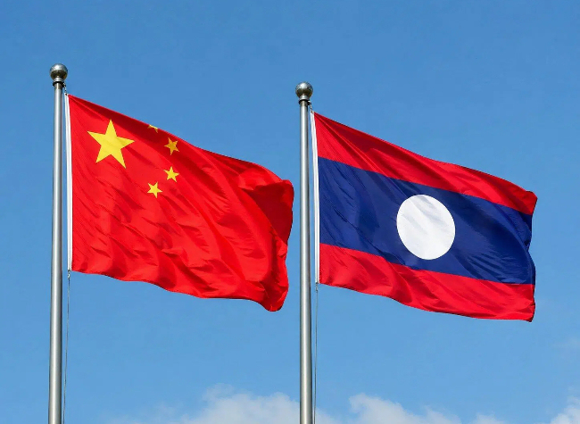 Xi Exchanges Congratulations with Top Lao Leader Thongloun on 65th Anniversary of Ties
