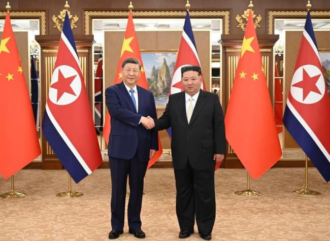 Xi, Kim Hold Talks in Pyongyang, Pledge to Advance China-DPRK Ties