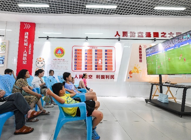 Too Hot Outside? Chongqing Residents Watch the World Cup in a Former Air-Raid Shelter