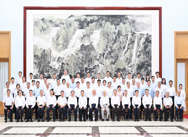 Senior CPC Official Visits Prominent Experts